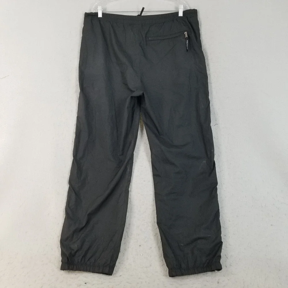 The North Face Pants Mens XL Black Windbreaker Stow Pocket Hiking Ankle Zip